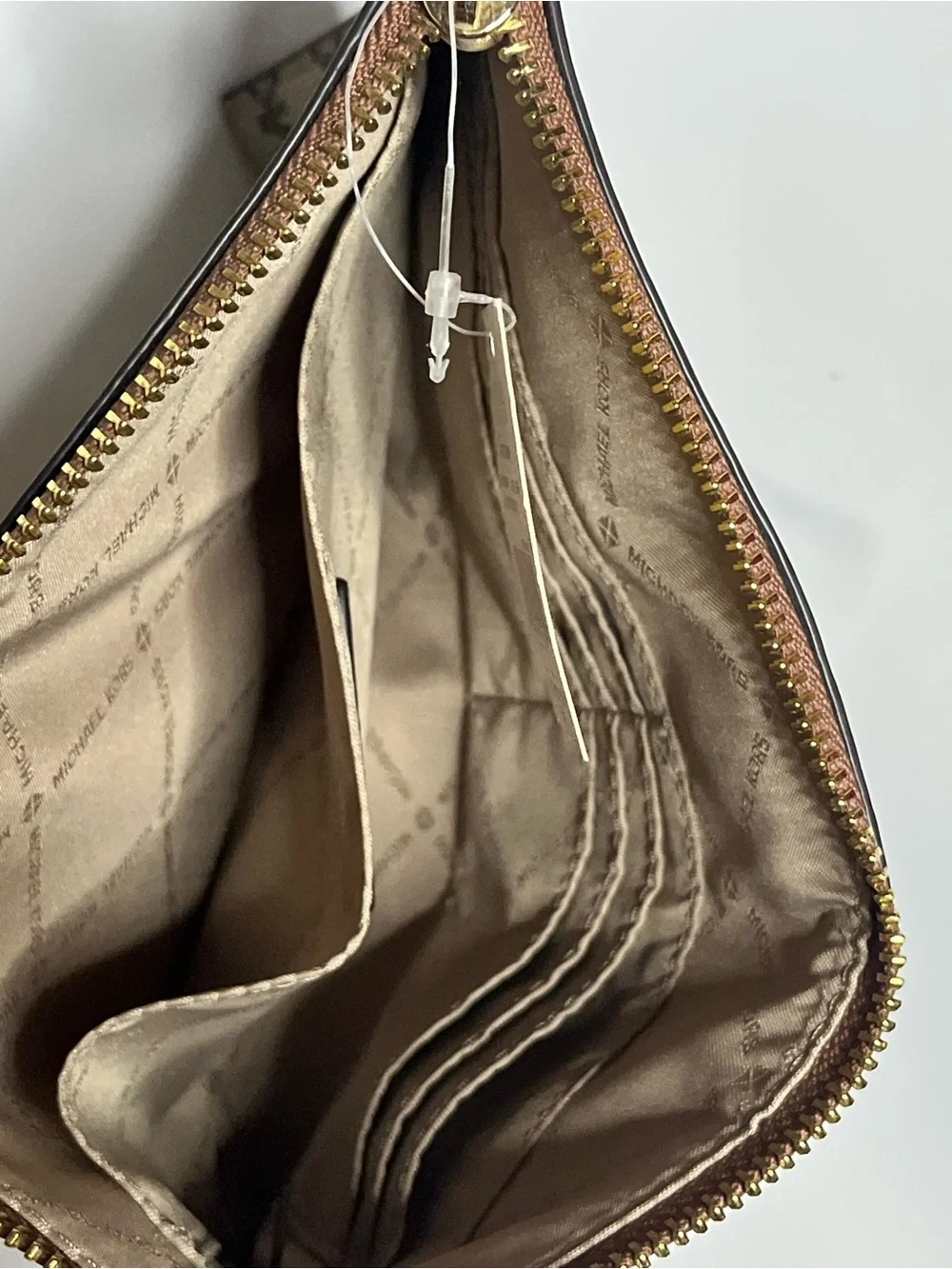 Michael Kors Tan/Brown Monogram Wristlet Pouch with Strap